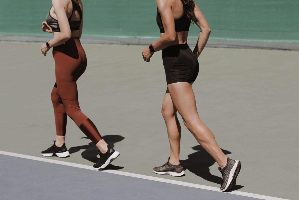 two women are walking